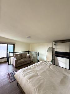 Een bed of bedden in een kamer bij Montavi Village