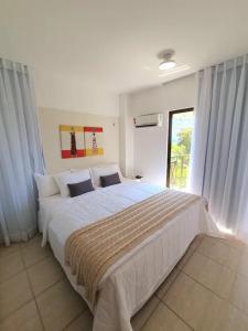 Ένα ή περισσότερα κρεβάτια σε δωμάτιο στο Beach Place Resort