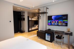 TV a/nebo společenská místnost v ubytování Hotel Majestic + 37 fotografií