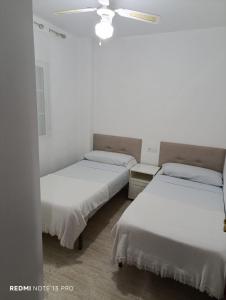 Posteľ alebo postele v izbe v ubytovaní Apartamento Residencial Puerta Roquetas
