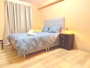 Ένα ή περισσότερα κρεβάτια σε δωμάτιο στο Seaview Flat Cobh