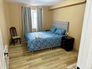 Ένα ή περισσότερα κρεβάτια σε δωμάτιο στο Seaview Flat Cobh