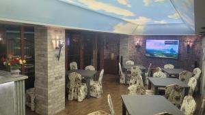 TV a/nebo společenská místnost v ubytování DALLAR Guest House