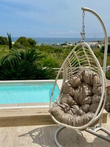 Bazén v ubytování Corallo nebo v jeho okolí