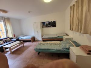 Postel nebo postele na pokoji v ubytování Pension Chen