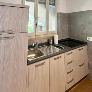 Kuchyň nebo kuchyňský kout v ubytování Conero casa- Marcelli di Numana in Via Litoranea 178 Fronte Mare con Pass Parcheggio Gratuito