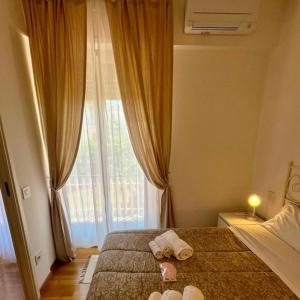 Postel nebo postele na pokoji v ubytování Conero casa- Marcelli di Numana in Via Litoranea 178 Fronte Mare con Pass Parcheggio Gratuito