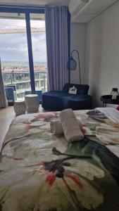 Ένα ή περισσότερα κρεβάτια σε δωμάτιο στο Ellipse Apartment, Lush Hideaway +28 φωτογραφίες