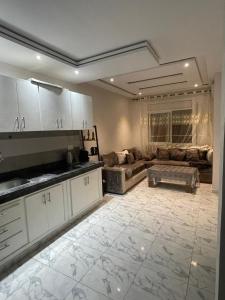 Kuchyň nebo kuchyňský kout v ubytování Appartement climatisé avec balcon proche plage