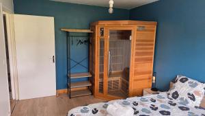Postel nebo postele na pokoji v ubytování Appart'Hotel Lizon Cocooning avec sauna
