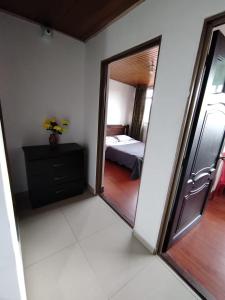 Postel nebo postele na pokoji v ubytování Hotel Preludio