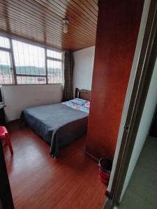 Postel nebo postele na pokoji v ubytování Hotel Preludio