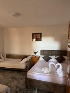 Postel nebo postele na pokoji v ubytování Apartments Zeneva