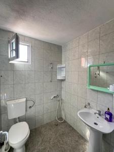 Koupelna v ubytování Apartments Zeneva