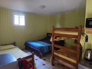 Postel nebo postele na pokoji v ubytování Refugio Natural Pucón
