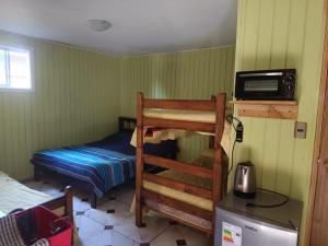 Postel nebo postele na pokoji v ubytování Refugio Natural Pucón