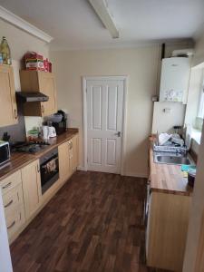 Η κουζίνα ή μικρή κουζίνα στο Erith House