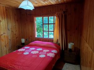 Postel nebo postele na pokoji v ubytování Refugio Natural Pucón