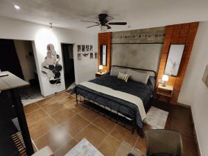 Postel nebo postele na pokoji v ubytování Casa Aceves & Bueno Hotel Boutique + 90 fotografií