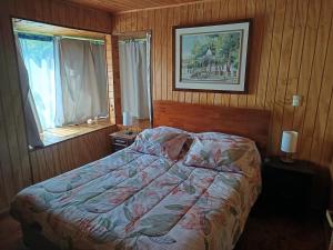 Postel nebo postele na pokoji v ubytování Refugio Natural Pucón