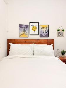 Una cama o camas en una habitación de Peaceful 1BR APT in Maculusso