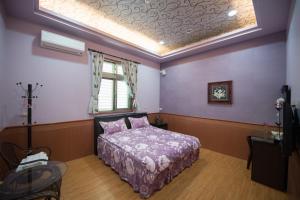 Postel nebo postele na pokoji v ubytování Sweetfishs Homestay