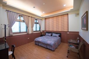 Postel nebo postele na pokoji v ubytování Sweetfishs Homestay