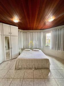 En eller flere senge i et værelse på COP-30 - Premium Comfort in Cidade Jardim I