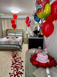 Itza-Bella Suites 객실 침대