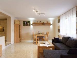 Et opholdsområde på modernly furnished holiday apartment