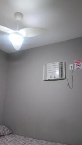 Postel nebo postele na pokoji v ubytování Hospedagem Cinelândia