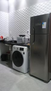 Kuchyň nebo kuchyňský kout v ubytování Hospedagem Cinelândia + 37 fotografií