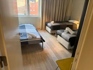 Ένα ή περισσότερα κρεβάτια σε δωμάτιο στο Charming apartment in the Heart of Brussels