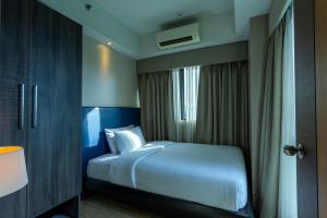 Santorini Hotel 객실 침대