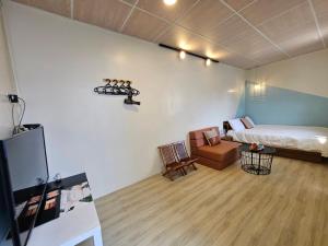 Postel nebo postele na pokoji v ubytování 舞浪海景旅店