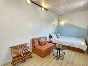 Postel nebo postele na pokoji v ubytování 舞浪海景旅店