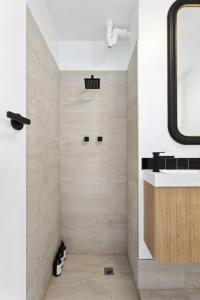 a bathroom with a shower and a sink at Med Vibes in North Freo in North Fremantle