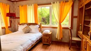 Ένα ή περισσότερα κρεβάτια σε δωμάτιο στο Campjohnhay Forest Home A1F +10 φωτογραφίες