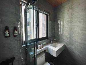 Koupelna v ubytování Shigang Homestay市港行旅