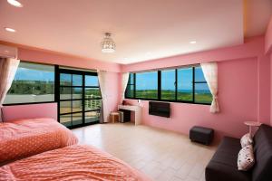 Postel nebo postele na pokoji v ubytování Sea People B&B
