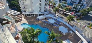 an overhead view of a swimming pool at a hotel at Broadbeach Holiday Apartments in Gold Coast