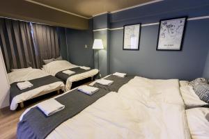 Ένα ή περισσότερα κρεβάτια σε δωμάτιο στο VIVA Apartment Yabacho +13 φωτογραφίες