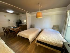 Ένα ή περισσότερα κρεβάτια σε δωμάτιο στο VIVA Apartment Yabacho