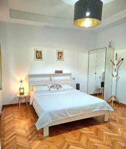 En eller flere senge i et værelse på Casa Bologna