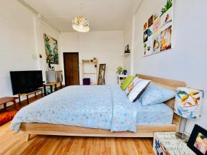 Ένα ή περισσότερα κρεβάτια σε δωμάτιο στο Gallery house 177-3min walk BTS near icon siam