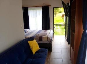 En eller flere senge i et værelse på Habitaciones campestres 202 + 4 billeder