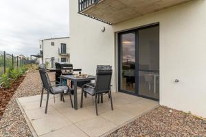 A balcony or terrace at SOLARIS APARTMÁNY Pálava