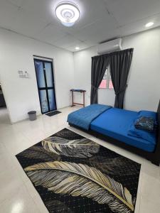 Ένα ή περισσότερα κρεβάτια σε δωμάτιο στο Nilam Puri