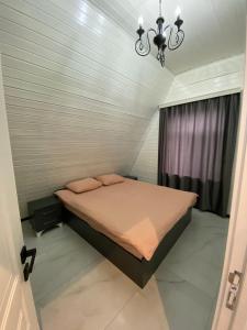 Postel nebo postele na pokoji v ubytování A frame House