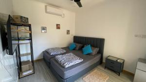 Postel nebo postele na pokoji v ubytování Grande Maldives Inn